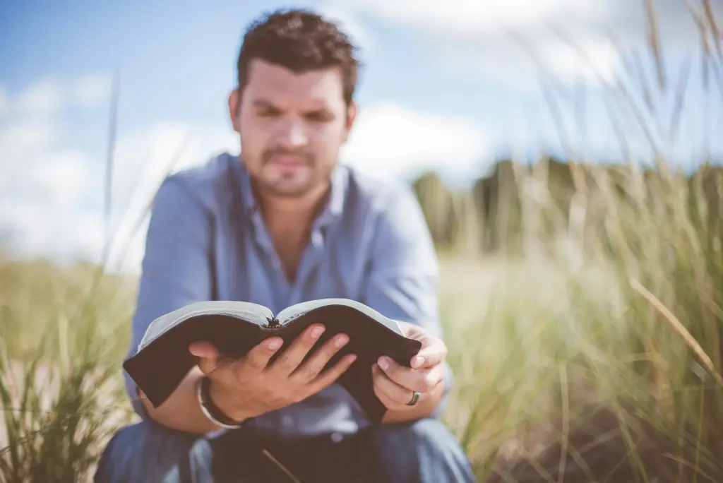 man with book