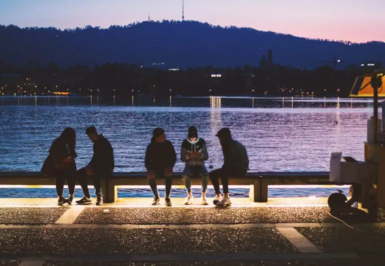 students at a lake